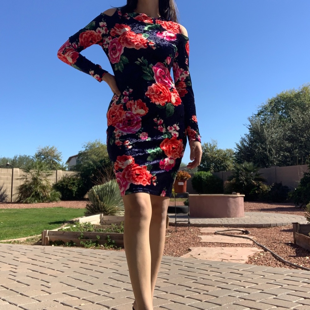 Red and green color women dress brand Leyva’s size medium